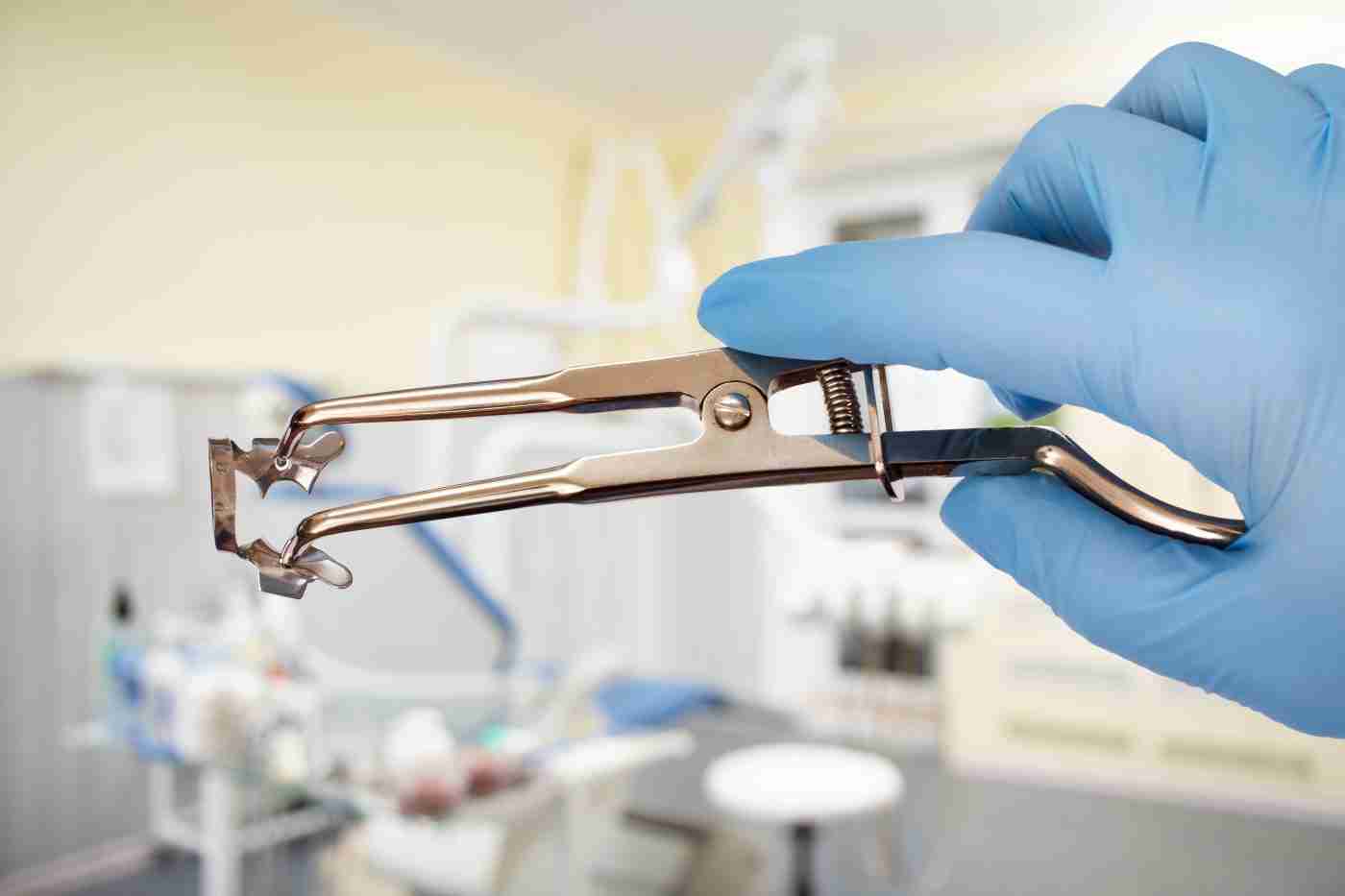 Rubber dam clamp forceps used during root canal treatment